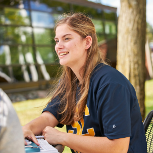 Student sitting outdoors