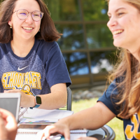 Students conversing outside