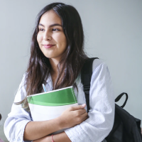 Student holding books