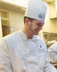 Student chef smiling