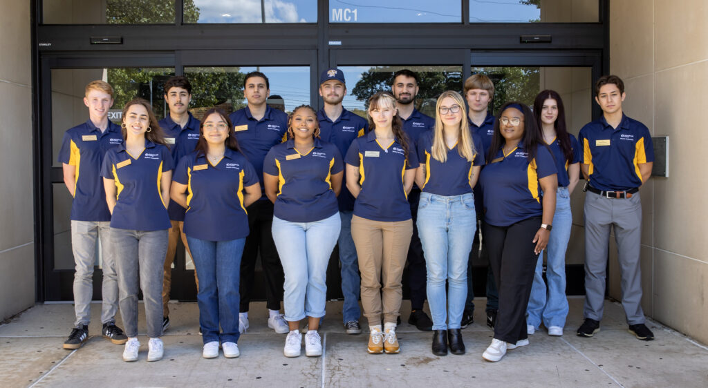 group of students pose for photo