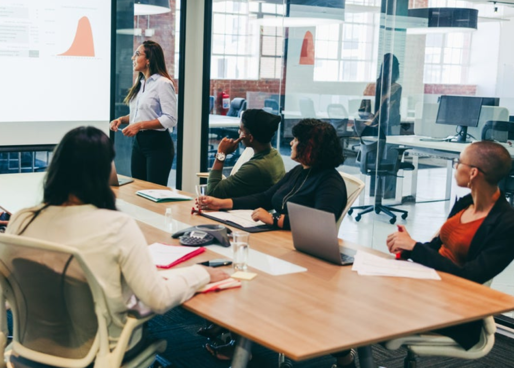 person giving presentation to group
