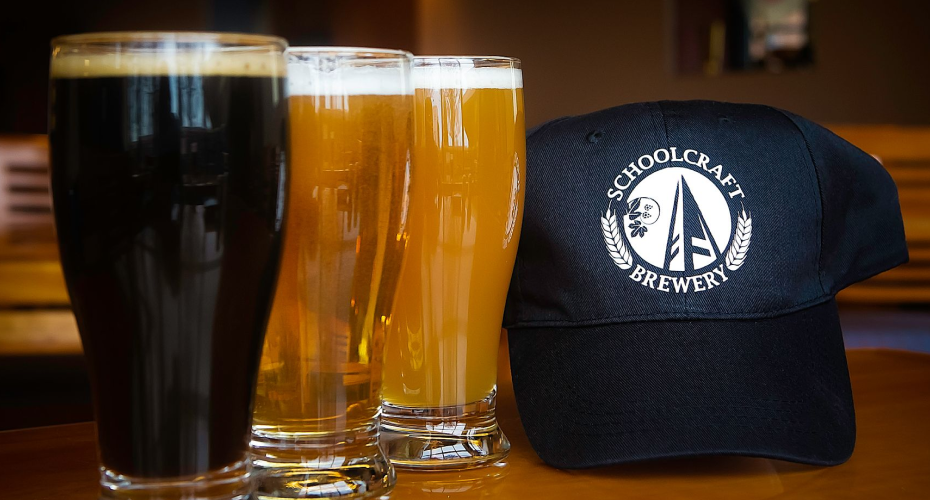 glasses of beer and a hat