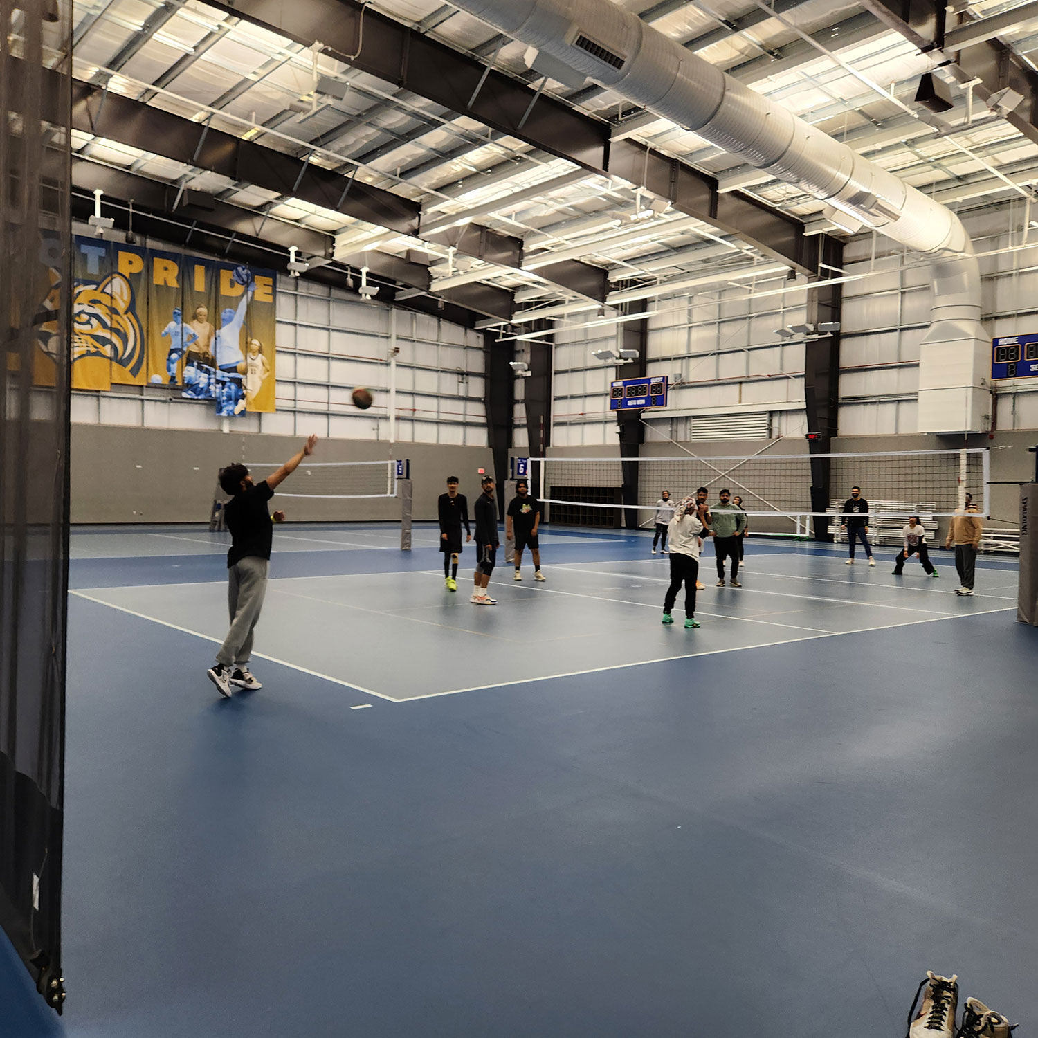 teams playing volleyball