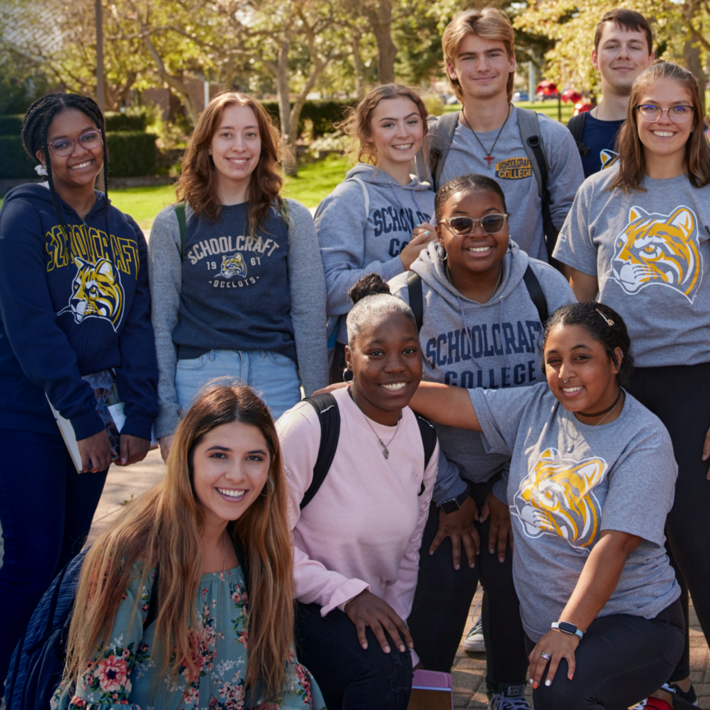 group of students smiling outdoors