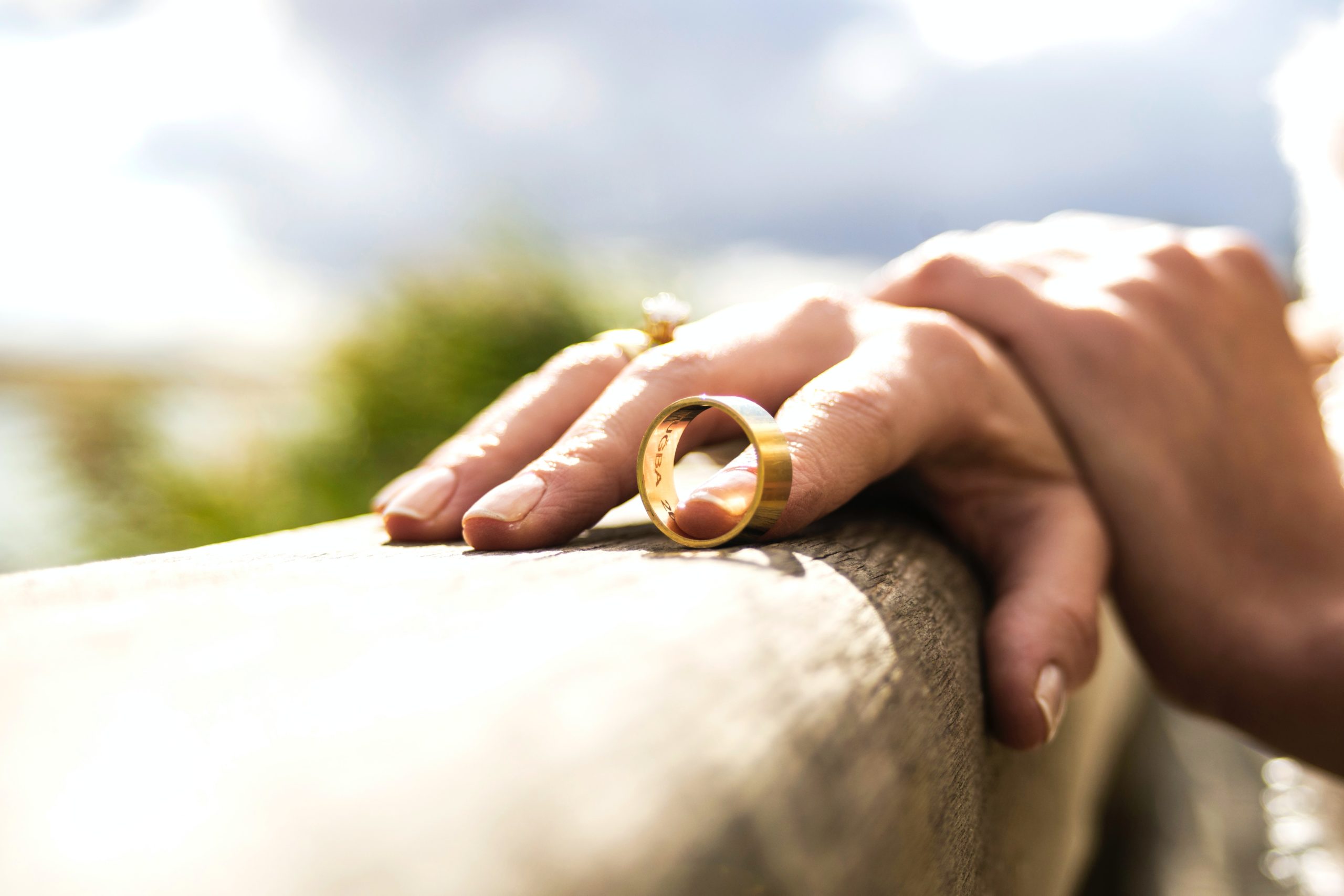 hand holding wedding ring