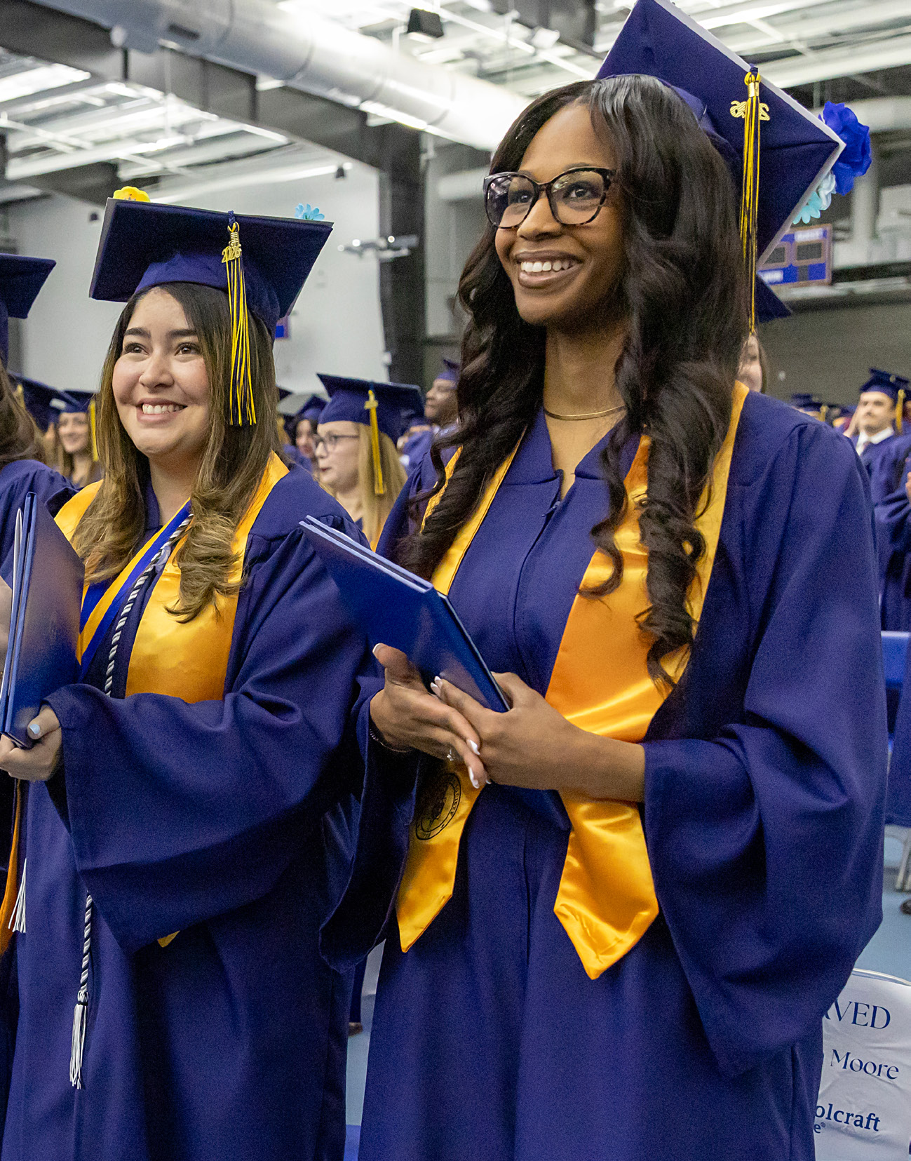 Schoolcraft graduates celebrating commencement