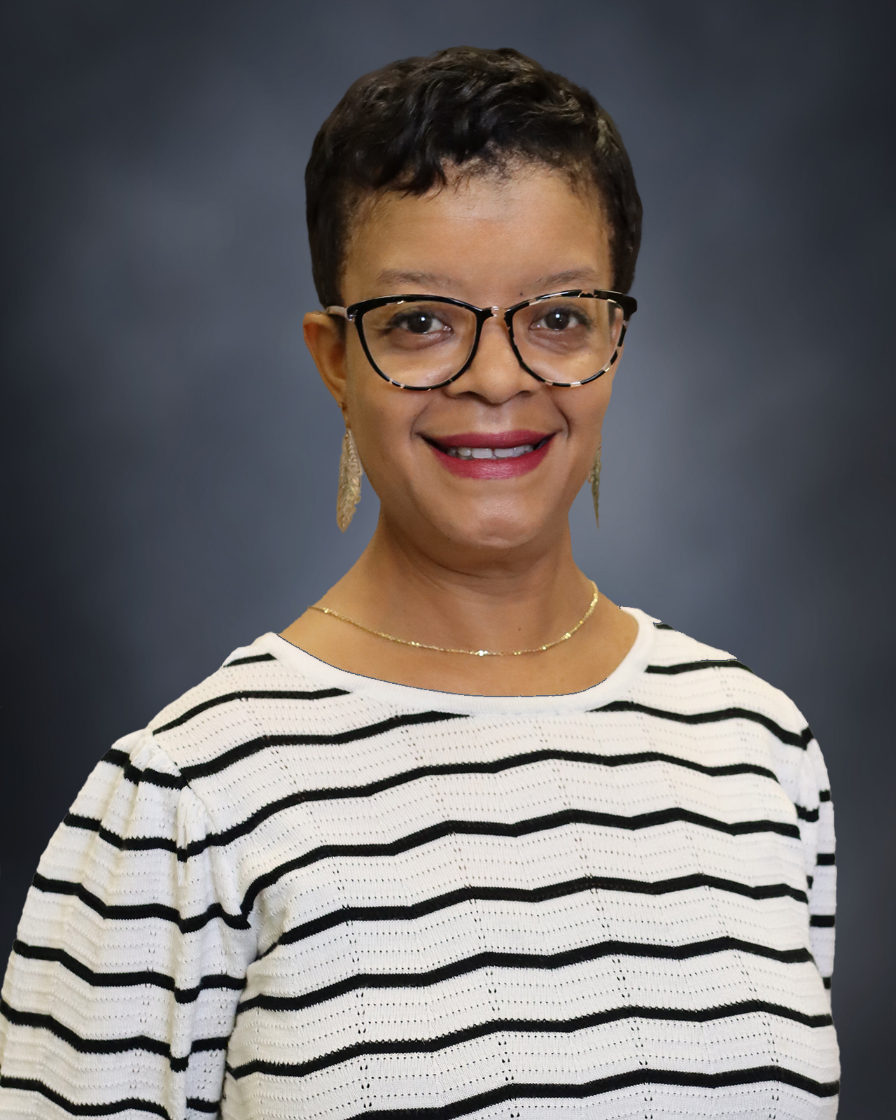 a woman wearing a striped shirt