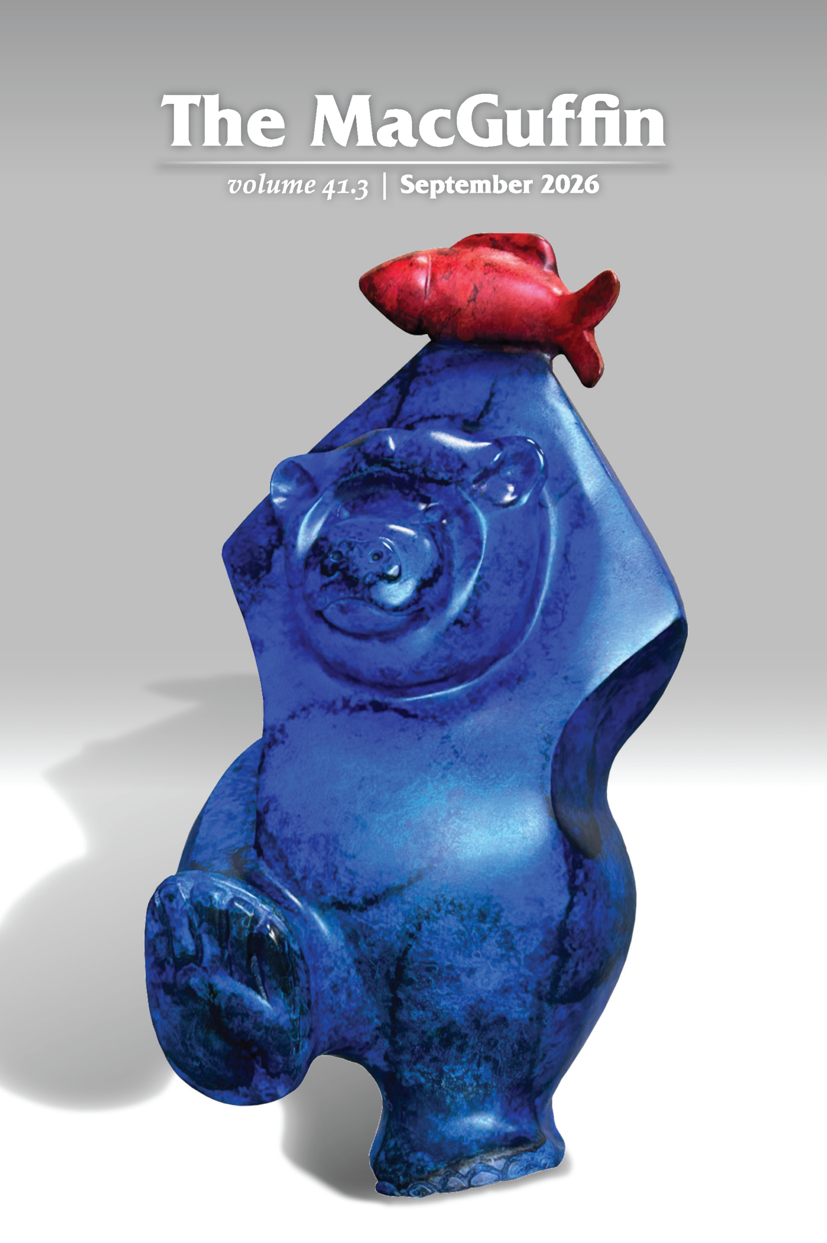 a picture of a blue sculpture with a red fish