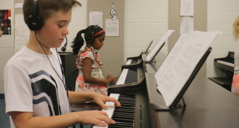 children playing piano