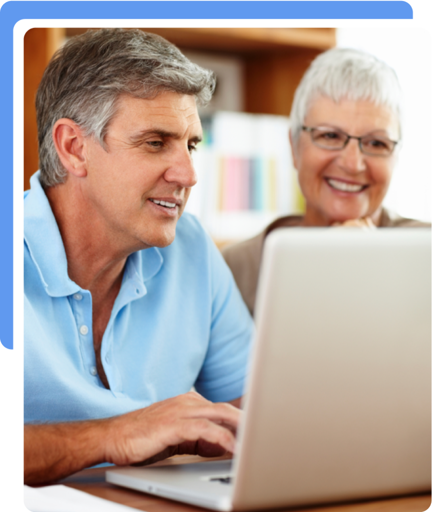 Two people engaged on a laptop screen