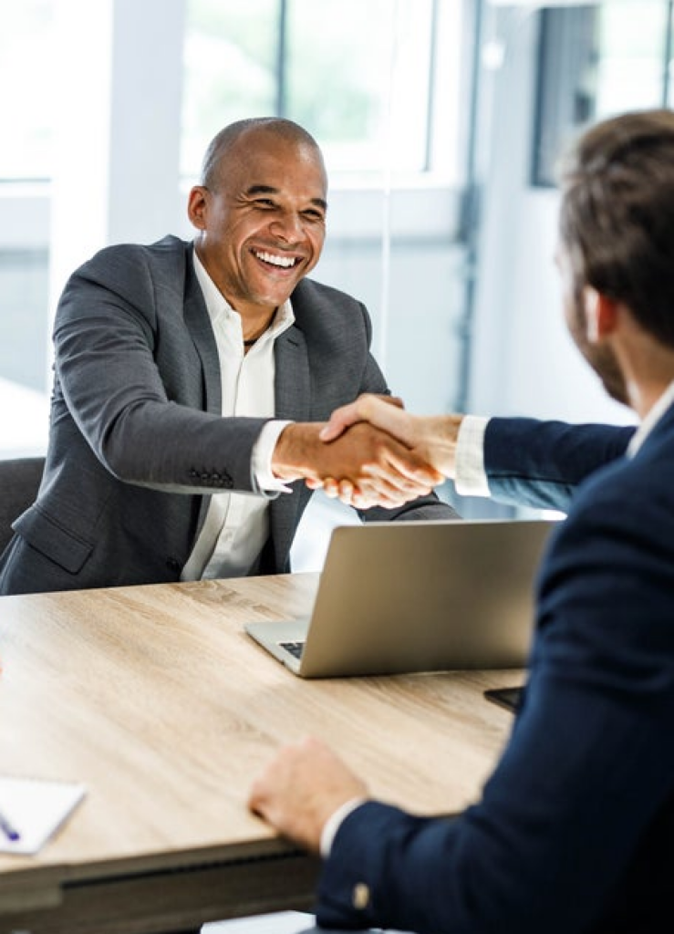 businessman shaking hands in meeting
