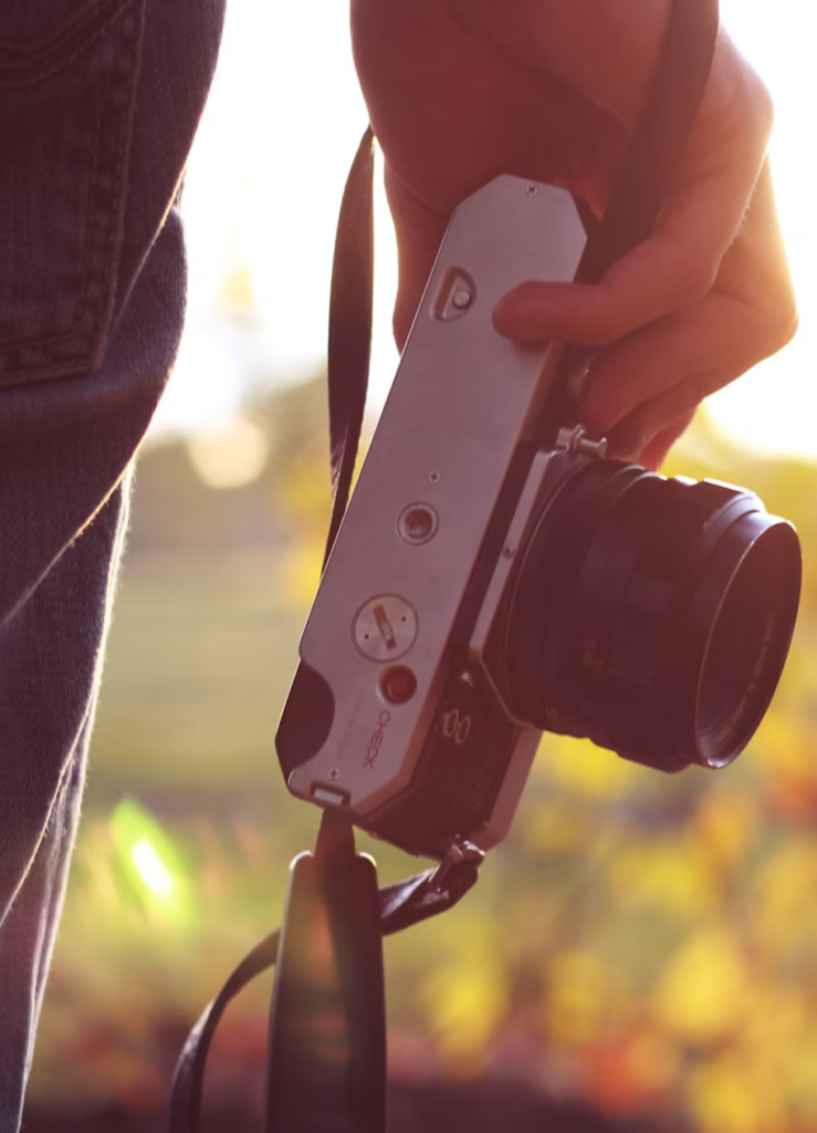 hand holding camera