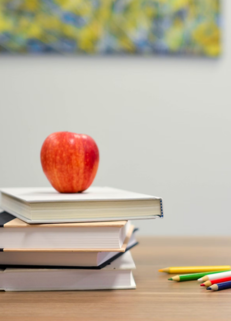 apple on a stack of books