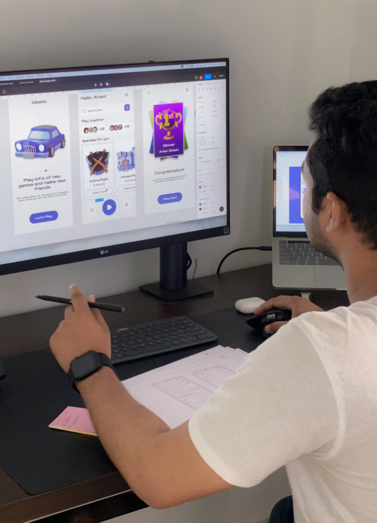 person designing a user interface on a computer