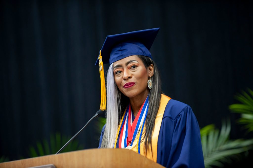 student speaking at podium