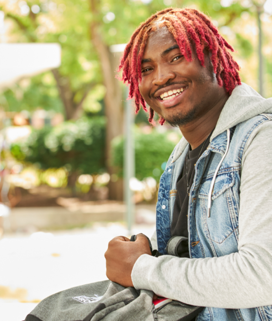 Student smiling outdoors