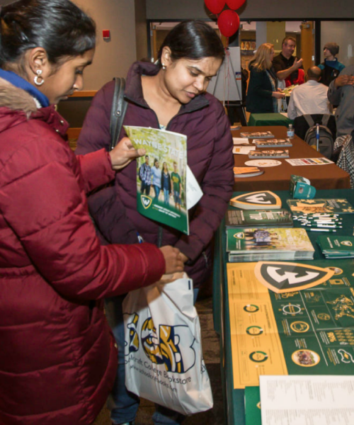 Students looking at table information