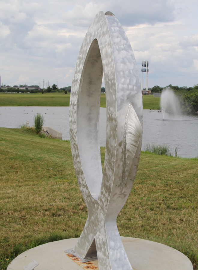 metal sculpture of fish-like structure