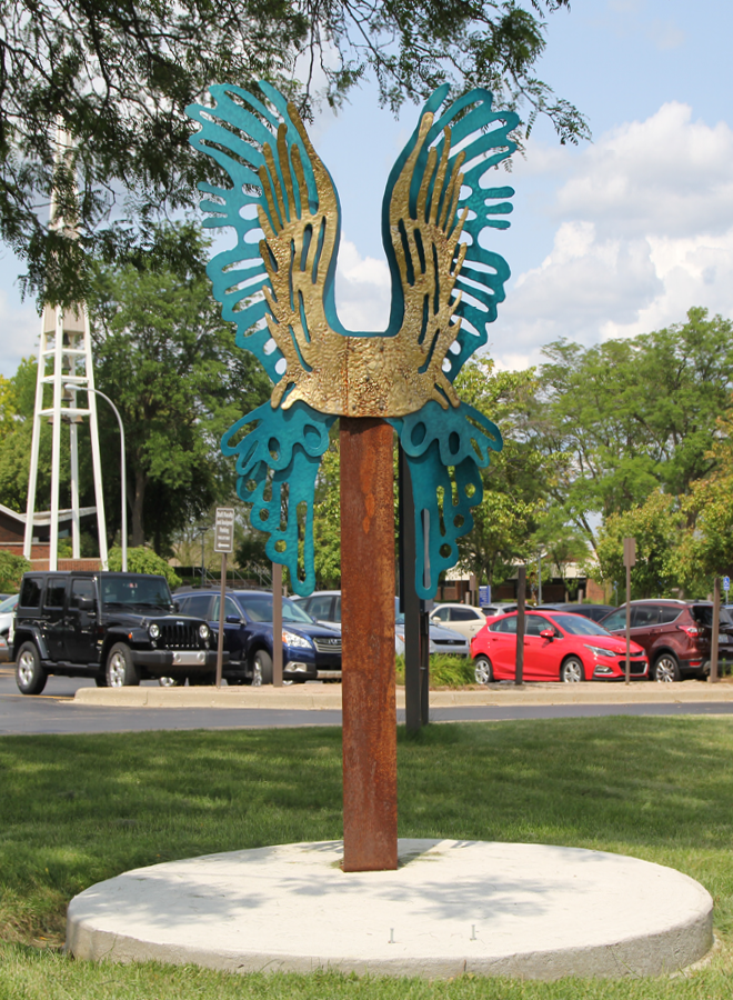 metal sculpture of wings