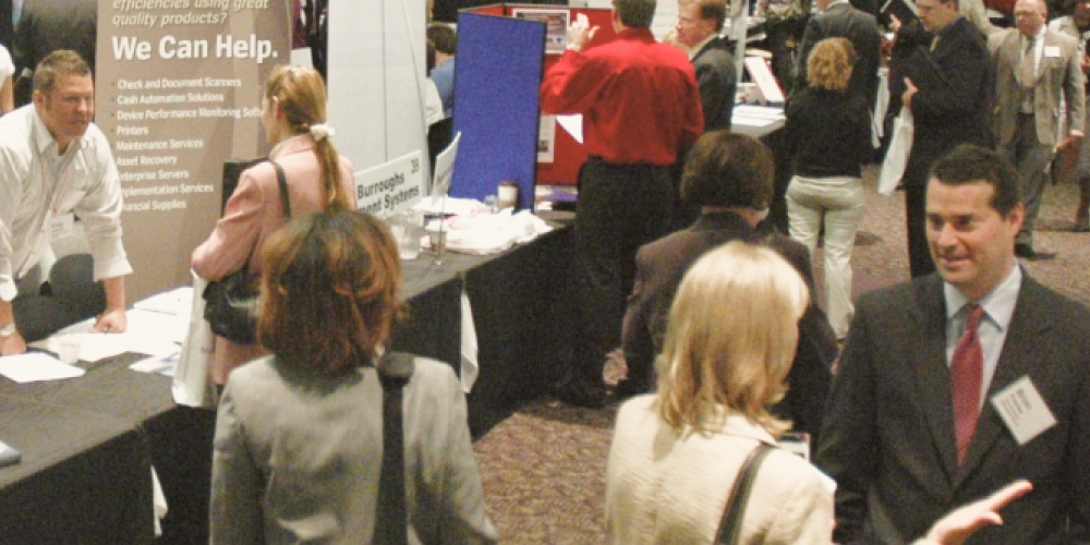 people walking and talking in event activity