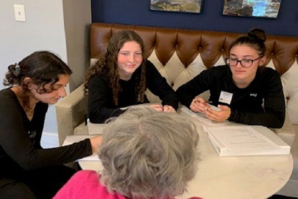 Students sitting around a round table