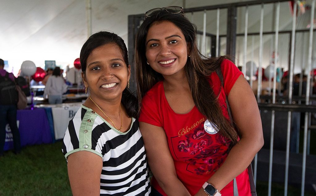 two students smiling