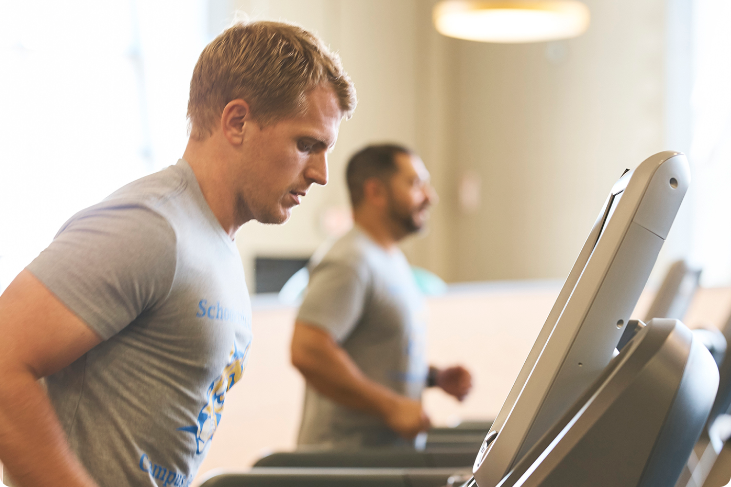 People on treadmill