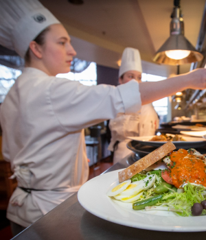 Chef and food plate