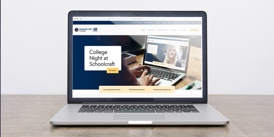 A computer with the Schoolcraft College website on its screen