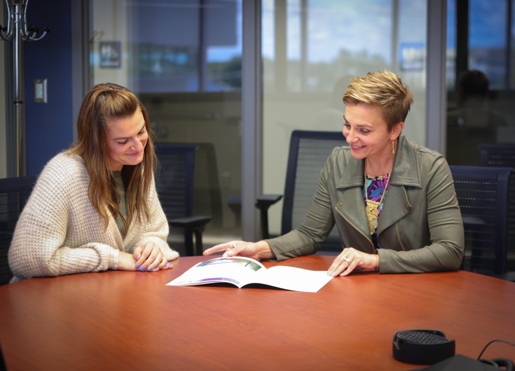 Tammy and another person working at a desk