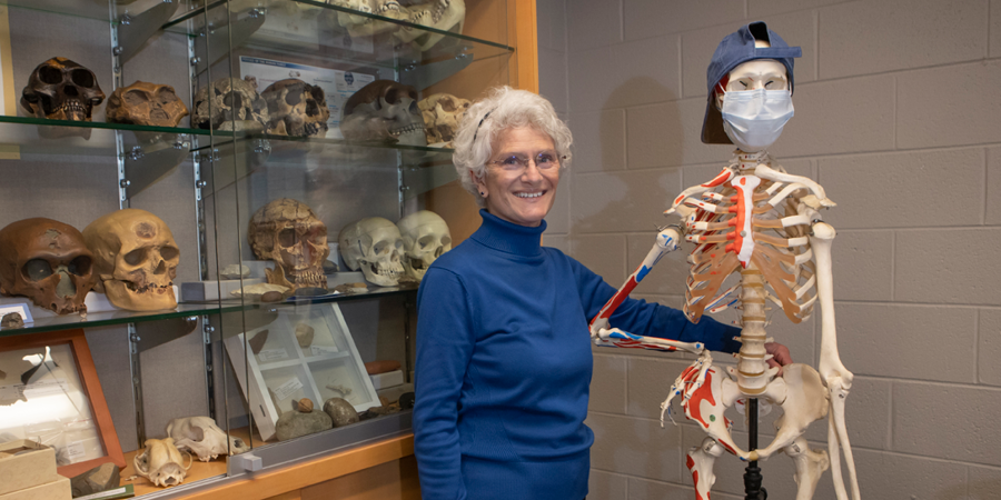 Professor Moore and a skeleton