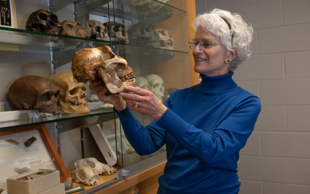 Professor Moore examining a skull