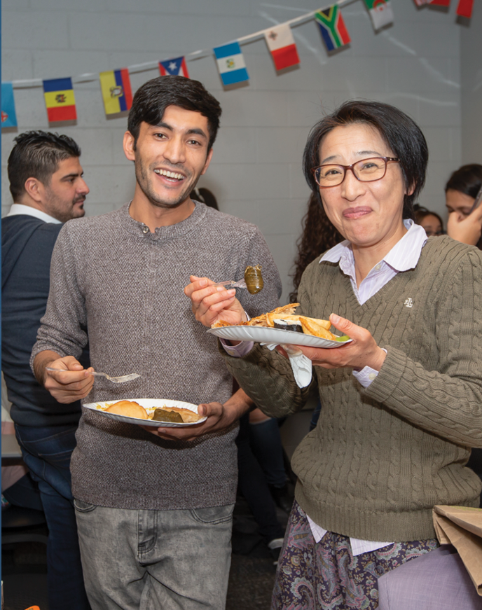 A group of people eating food