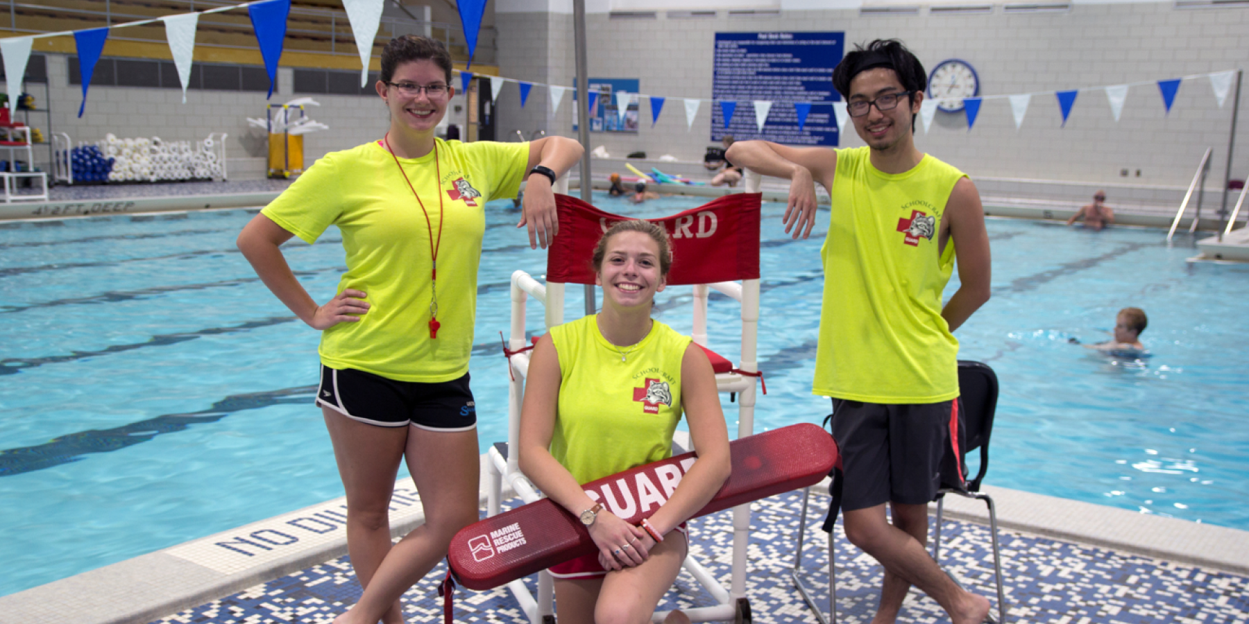 Lifeguards by a pool