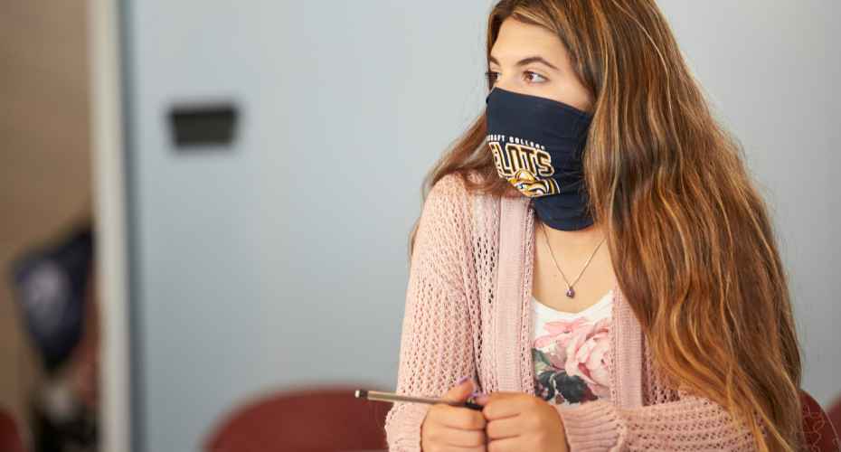 Student wearing a face mask in a classroom