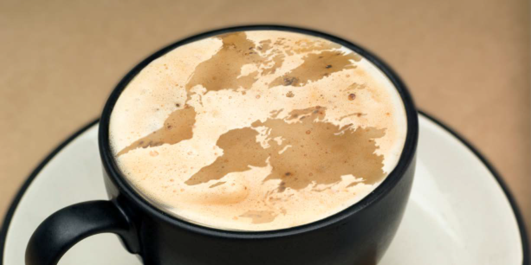coffee cup with world shape foam