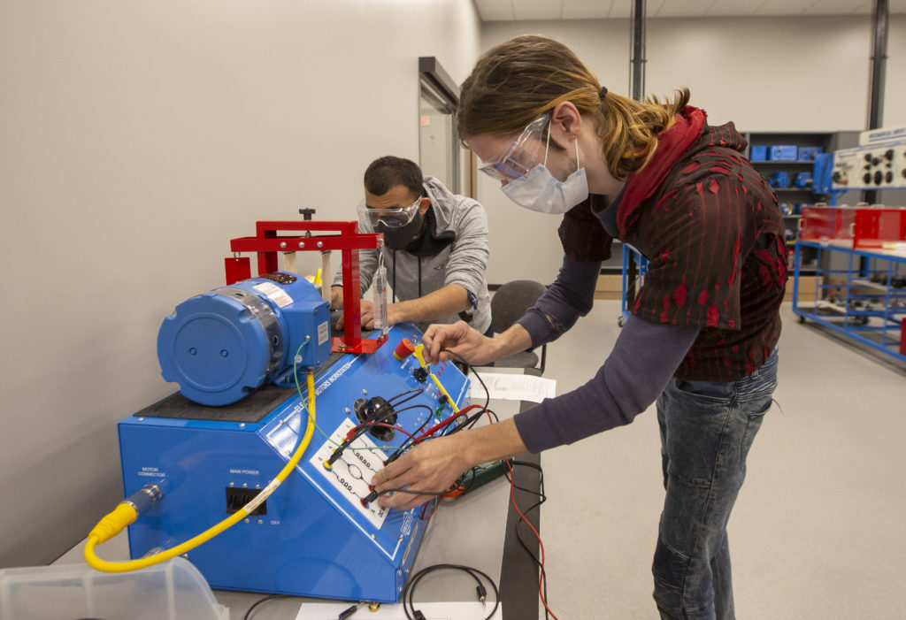 Students using equipment