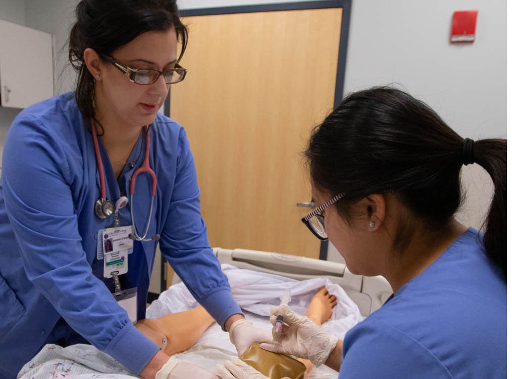 Two nursing students working
