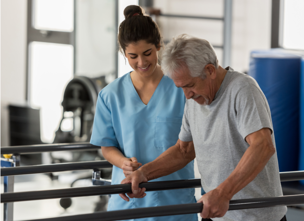 Someone helping a patient walk