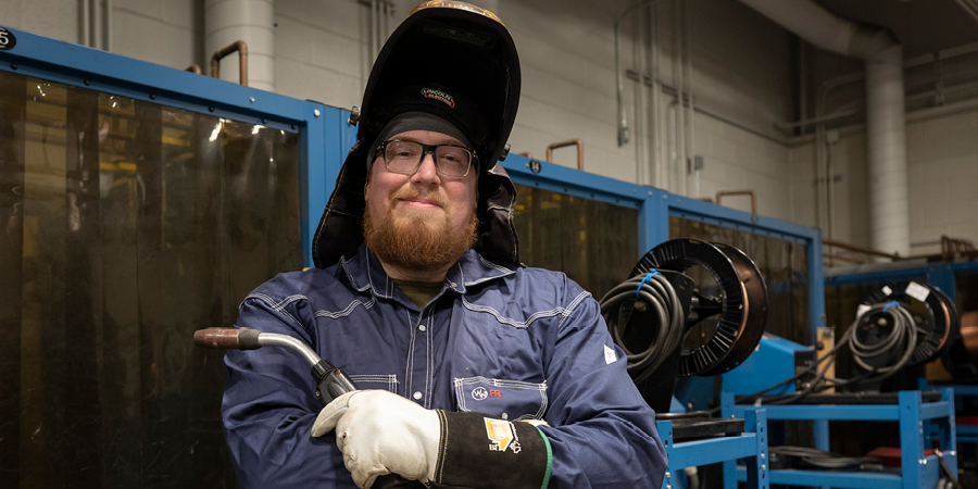 Ken Forbes in welding gear