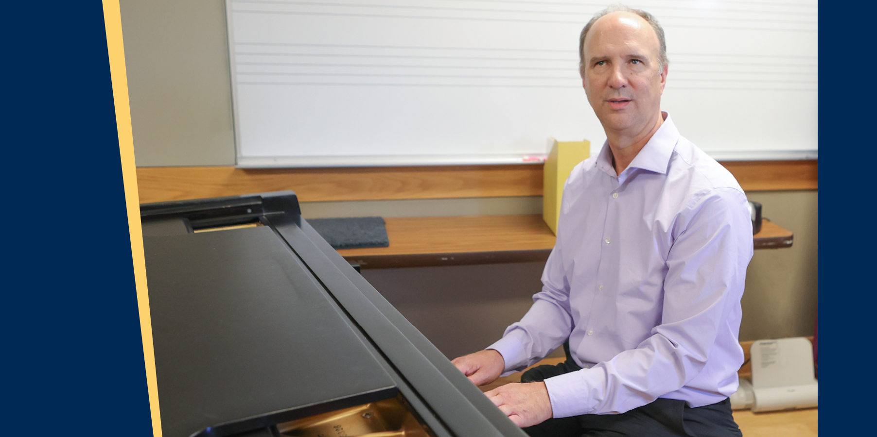 Dr. Frederick Moss at piano