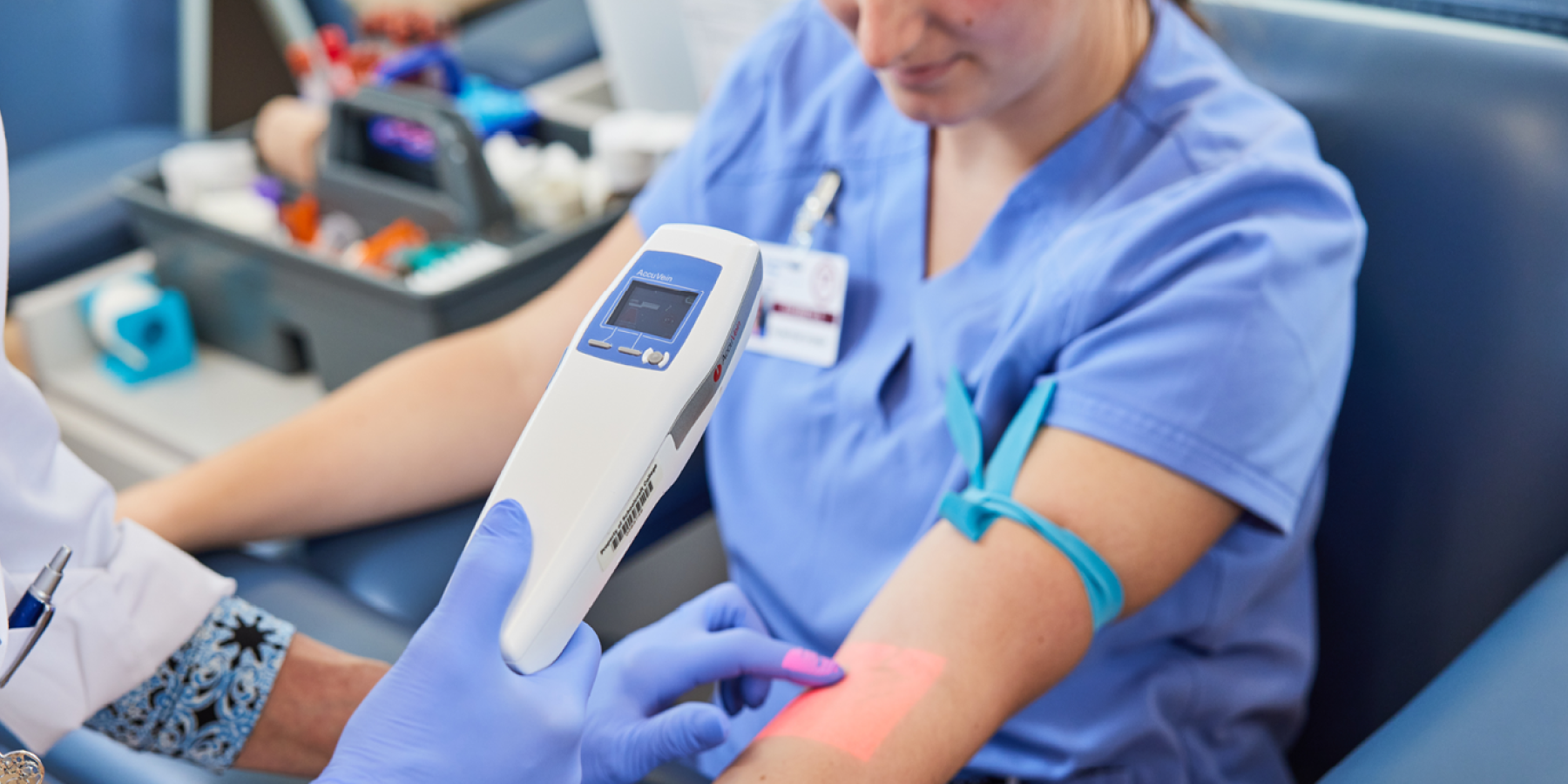 doctor scanning patient arm