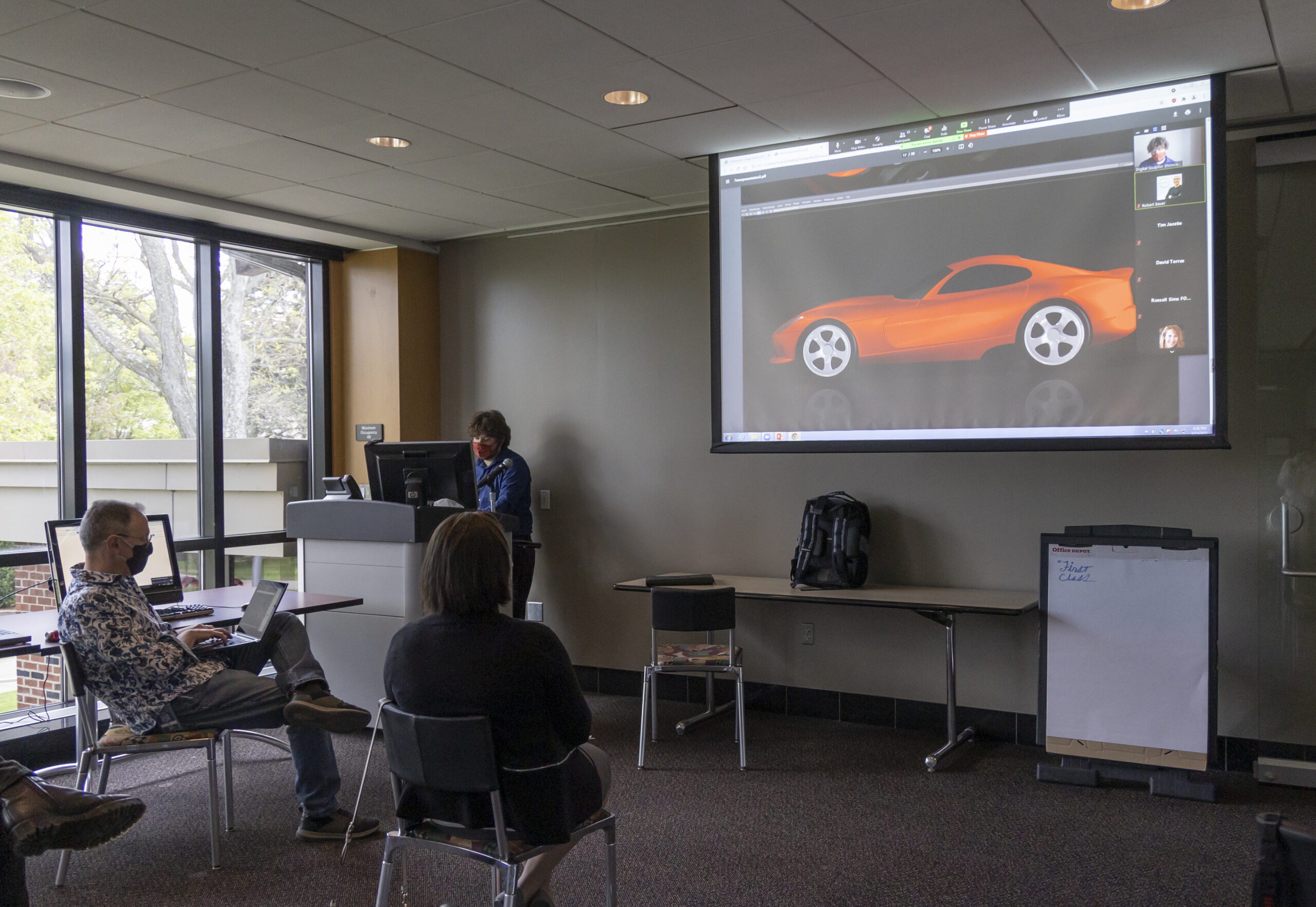 classroom projector displaying a car