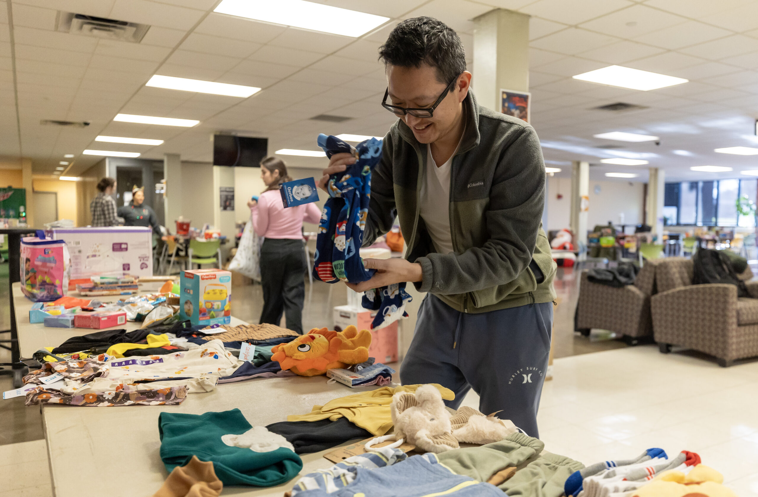person organizing tables of products