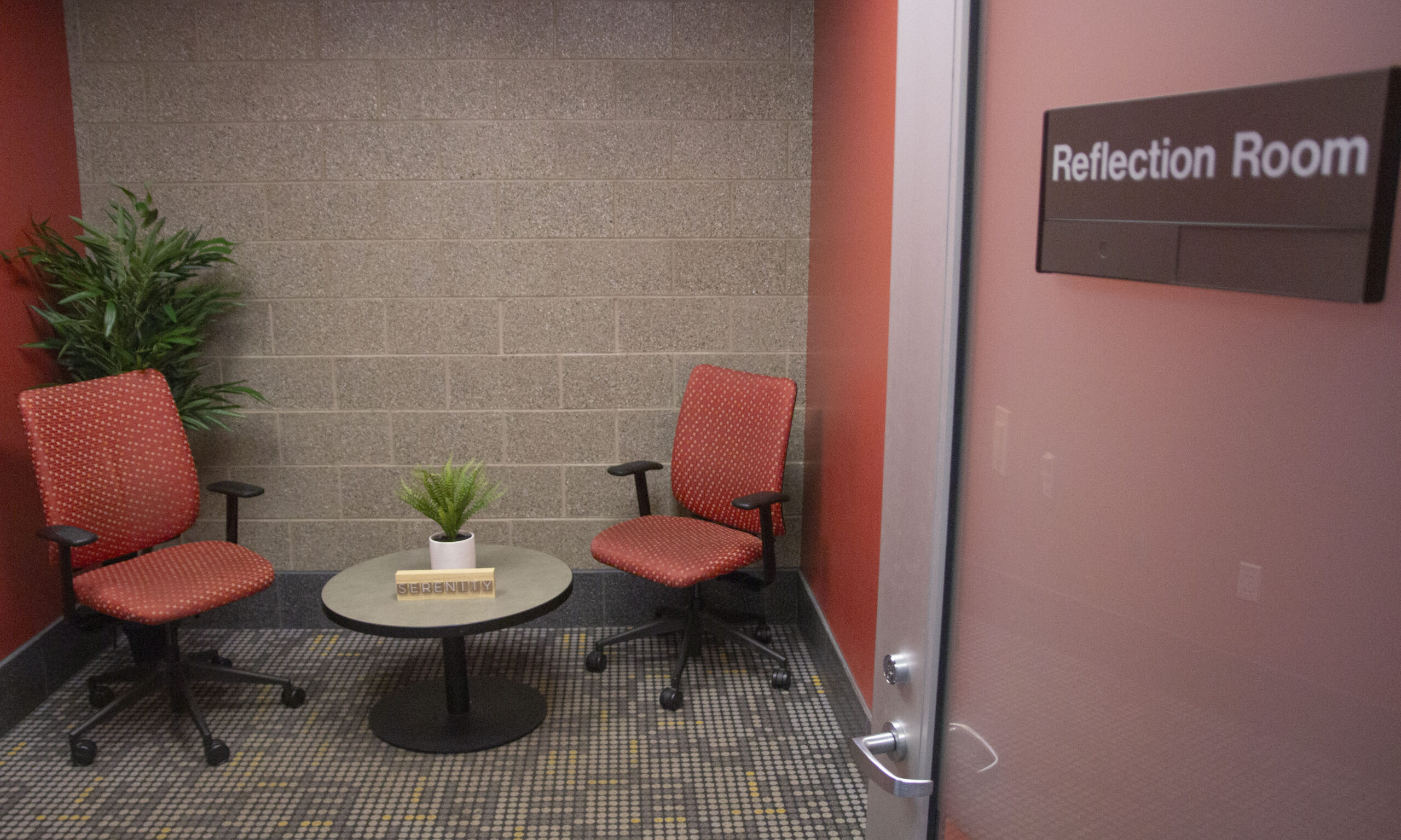 small room with table and chairs