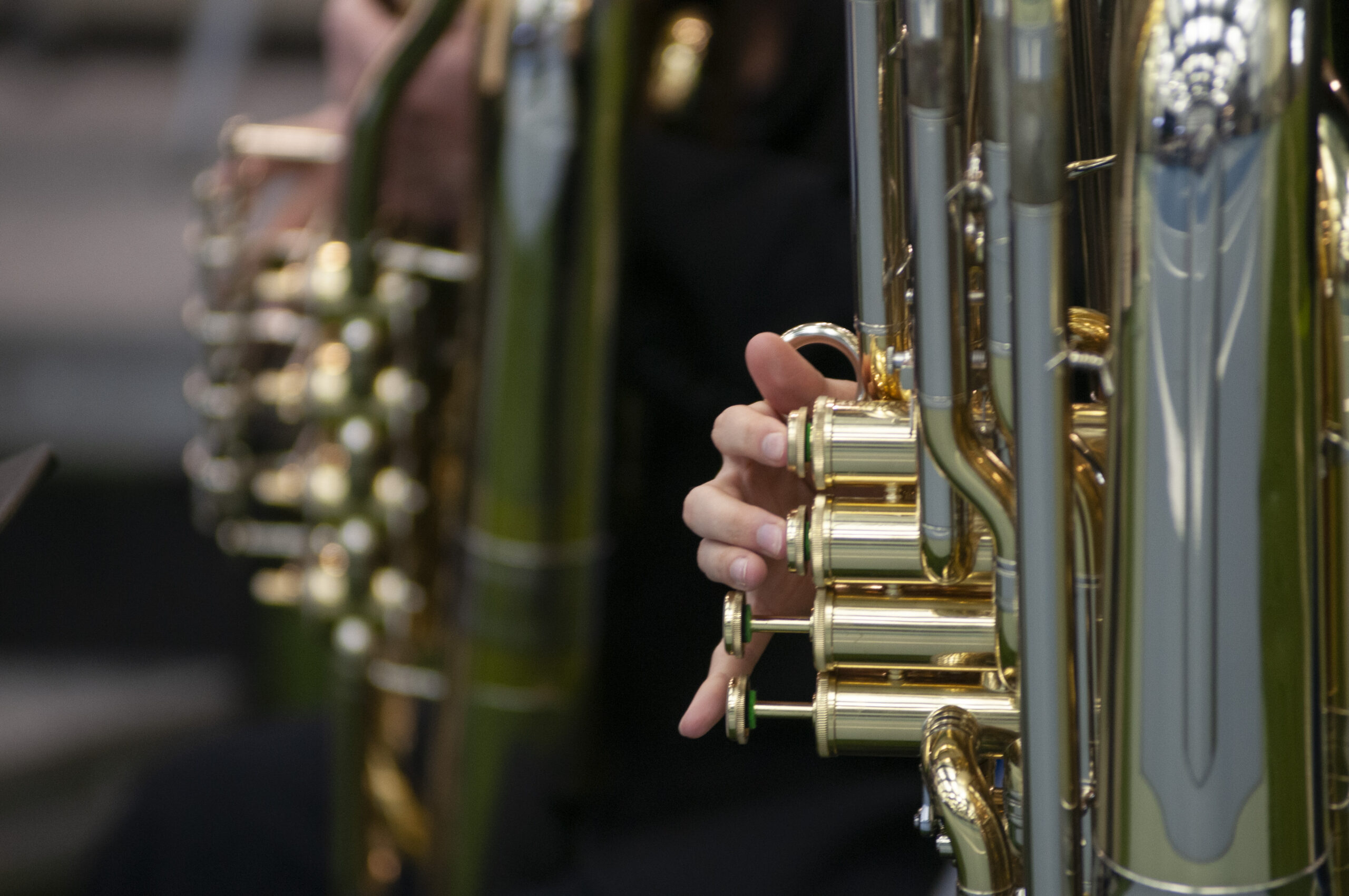 close up of tuba instrument keys