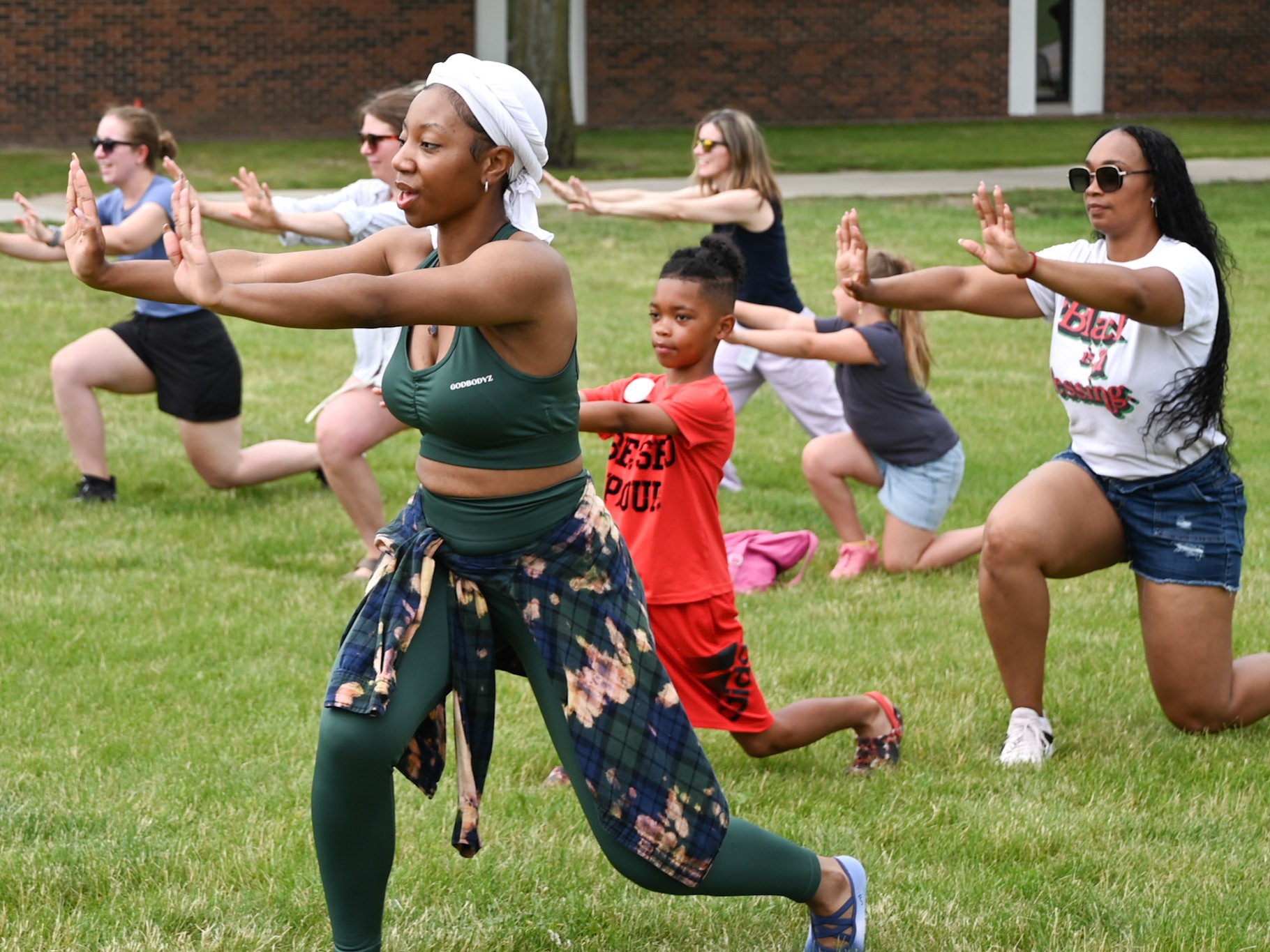 group doing stretches outdoors