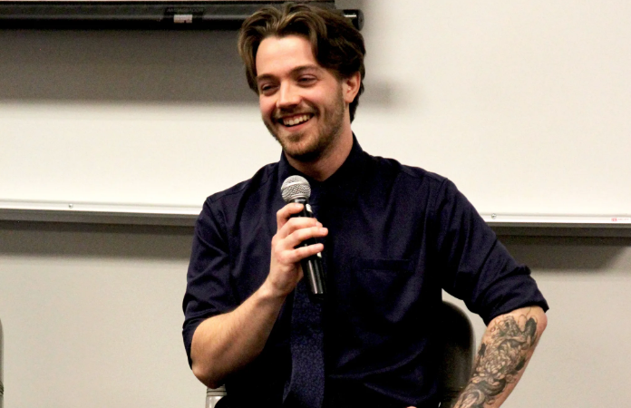 person speaking with mic