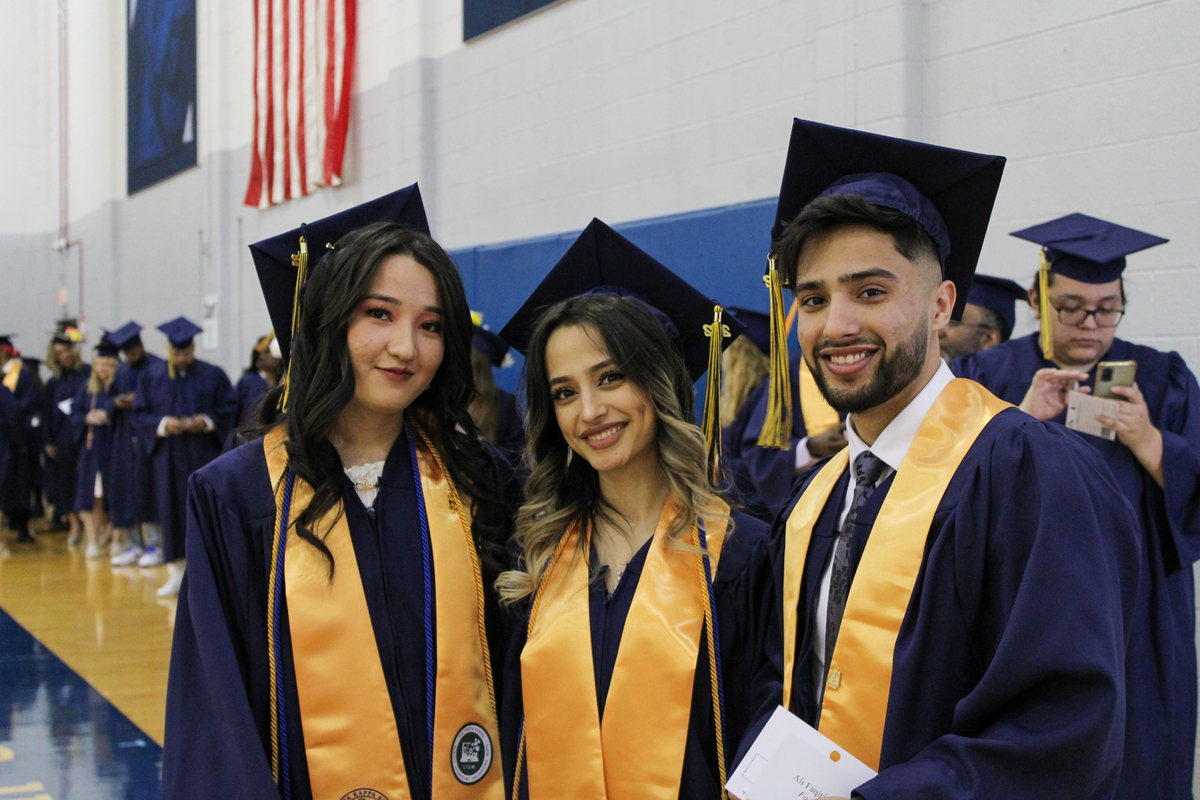group of grad students in regalia